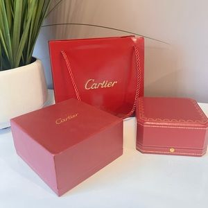 Empty Cartier box with paper bag.